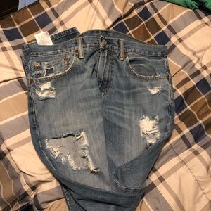 Levi 511 ripped jeans